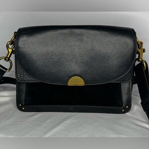 Coach black leather crossbody shoulder bag with adjustable strap.